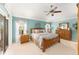 Spacious bedroom with light blue walls and a ceiling fan at 1397 Oak Forest Dr, The Villages, FL 32162