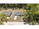 Aerial view of a charming home with a spacious lot, showcasing its curb appeal and neighborhood setting at 15304 Sw 27 Ln, Ocala, FL 34481