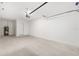 Spacious garage with painted concrete flooring and plenty of room for two cars and storage at 15304 Sw 27 Ln, Ocala, FL 34481
