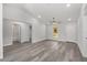 Light-filled living room features gray floors, high ceilings, and an open layout perfect for entertaining at 15304 Sw 27 Ln, Ocala, FL 34481