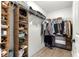 Well-organized walk-in closet with shelving and hanging space at 1561 Ne 160Th Pl, Citra, FL 32113