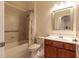 Bathroom features a shower/tub combo and a modern vanity at 16205 Sw 12Th Ter, Ocala, FL 34473