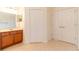 Main bathroom with dual sinks and linen closet at 16205 Sw 12Th Ter, Ocala, FL 34473