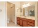 Bathroom boasts a vanity with drawers and a toilet at 16205 Sw 12Th Ter, Ocala, FL 34473