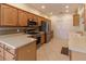 Kitchen with stainless steel appliances and light wood cabinets at 16205 Sw 12Th Ter, Ocala, FL 34473