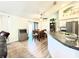 Dining area with hardwood floors and access to the kitchen at 22 Hemlock Trl, Ocala, FL 34472