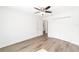 Bright bedroom featuring a ceiling fan, closet and ensuite bathroom at 2270 Sw 141St Ter, Ocala, FL 34481