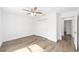 Bedroom showcasing wood-look floors, a ceiling fan, and a closet for storage at 2270 Sw 141St Ter, Ocala, FL 34481