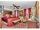 Spacious bedroom with king-size bed and ornate headboard at 2418 Ne 7Th St # 10, Ocala, FL 34470