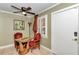 Small dining area with a round table and two chairs at 2418 Ne 7Th St # 10, Ocala, FL 34470