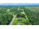 Aerial view of house in a wooded area at 2701 Sw 175Th Loop, Ocala, FL 34473