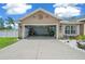 Attached garage with open door, showing ample space at 2701 Sw 175Th Loop, Ocala, FL 34473