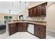 Kitchen boasting ample counter space and dark wood cabinets at 2701 Sw 175Th Loop, Ocala, FL 34473