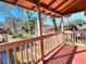 Small balcony overlooking the backyard and neighborhood at 309 Ne Sanchez Ave, Ocala, FL 34470