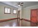 Spacious bedroom with hardwood floors and ample closet space at 309 Ne Sanchez Ave, Ocala, FL 34470