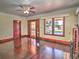 Spacious living room featuring hardwood floors and a fireplace at 309 Ne Sanchez Ave, Ocala, FL 34470