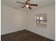 Bedroom features hardwood floors and a large window at 317 Ne Sanchez Ave, Ocala, FL 34470