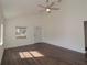 Bright living room with hardwood floors and neutral walls at 317 Ne Sanchez Ave, Ocala, FL 34470