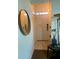 Bright entryway with a mirror, coat closet and tiled floor at 3396 Parkchester Square Blvd # 103, Orlando, FL 32835