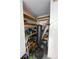 Garage with storage shelving and a punching bag at 3396 Parkchester Square Blvd # 103, Orlando, FL 32835