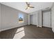 Bright bedroom with vinyl plank flooring and a spacious closet at 4152 Se 131 Ln, Summerfield, FL 34491