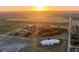 Aerial view of a home on a large lot with surrounding farmland at 6255 Mercantile Ln, Fort Meade, FL 33841