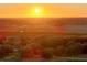 Sunset aerial view of farm with pastures and trees at 6255 Mercantile Ln, Fort Meade, FL 33841