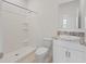 Clean bathroom with a shower/tub combo and vanity at 6267 Se 13Th St, Ocala, FL 34472