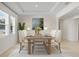 Elegant dining room featuring a wood table and neutral decor at 6267 Se 13Th St, Ocala, FL 34472