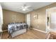 Bright bedroom featuring a comfortable bed and built-in storage at 6490 Sw 84Th St, Ocala, FL 34476