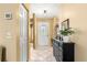 Welcoming entryway with storage and view to living area at 6490 Sw 84Th St, Ocala, FL 34476