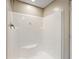 Clean shower stall with built-in seat at 6555 Se 165Th Ave, Ocklawaha, FL 32179