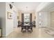 Bright dining room with table and chairs near entryway at 6767 Sw 91St Cir, Ocala, FL 34481