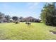 House exterior view with well-maintained lawn at 6767 Sw 91St Cir, Ocala, FL 34481