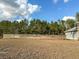 Wooden fence surrounding a large grassy area at 7045 Greengrove Blvd, Clermont, FL 34714