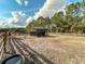 Water trough and hay feeder in a large pasture at 7045 Greengrove Blvd, Clermont, FL 34714