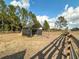 Hay feeder in a pasture with wooden fence at 7045 Greengrove Blvd, Clermont, FL 34714