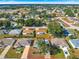 Aerial view showcasing a single-story home in a residential neighborhood at 8594 Sw 61St Ct, Ocala, FL 34476