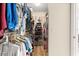 Walk-in closet with ample shelving and hanging space at 8594 Sw 61St Ct, Ocala, FL 34476