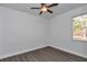 Spacious bedroom with ceiling fan and hardwood floors at 8786 Sw 127 Ave, Dunnellon, FL 34432