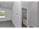 Laundry room with sink, cabinets, and overhead shelving at 8786 Sw 127 Ave, Dunnellon, FL 34432