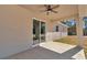 Covered patio with sliding glass door access at 8786 Sw 127 Ave, Dunnellon, FL 34432