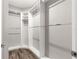 Walk-in closet with custom shelving for maximum storage and organization at 8902 Sw 75Th Loop, Ocala, FL 34481