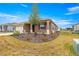 Cozy single-story home with manicured landscaping, a well-kept lawn, and a welcoming front entrance at 8902 Sw 75Th Loop, Ocala, FL 34481