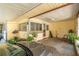 View of the covered carport featuring a concrete floor and space for parking and potted plants at 9352 Ne 27Th Ter, Anthony, FL 32617