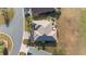 Overhead shot of the backyard of a home with mature landscaping and backyard patio at 9651 Se 137Th Street Rd, Summerfield, FL 34491