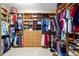 Organized walk-in closet with custom shelving and ample storage space at 9651 Se 137Th Street Rd, Summerfield, FL 34491