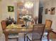 Dining room features a wood table and hutch at 11256 Sw 78Th Ave, Ocala, FL 34476