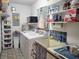 Laundry room with washer, dryer, and extra storage at 11256 Sw 78Th Ave, Ocala, FL 34476