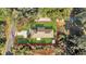 House and yard viewed from above showcasing the house's footprint and landscaping at 12854 Se 118Th Ter, Ocklawaha, FL 32179